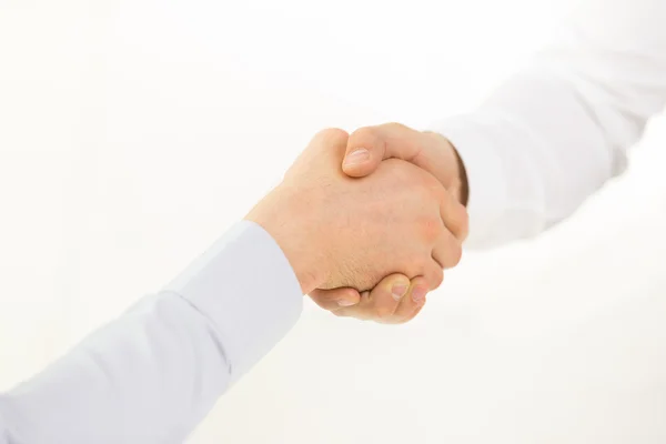 Close up of hands making handshake in office — Stock Photo, Image