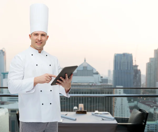 Happy male chef cook holding tablet pc — Stock Photo, Image