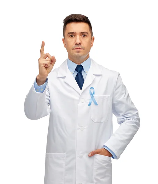 Male doctor with prostate cancer awareness ribbon — Stock Photo, Image