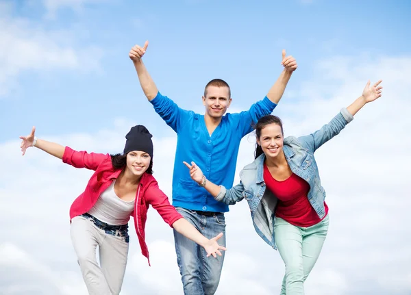 Group of teenagers dancing Stock Picture