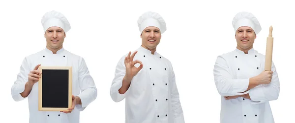 Happy male chef baker with menu board showing ok — Stock Photo, Image