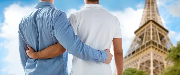 Close up of male gay couple over eiffel tower — Stock Photo, Image