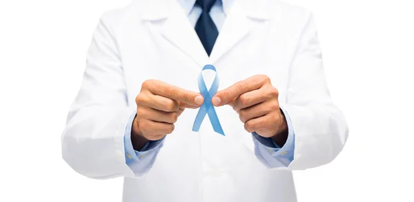 Doctor with prostate cancer awareness ribbon — Stock Photo, Image