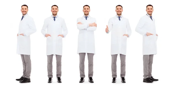 Happy doctors with stethoscope showing thumbs up — Stock Photo, Image