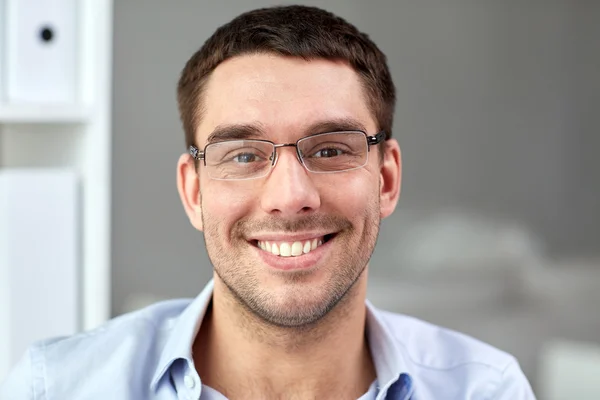 Portrait of businessman in eyeglasses at office — Stock Photo, Image