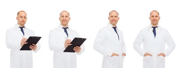 Happy doctors with clipboard and stethoscope — Stok fotoğraf