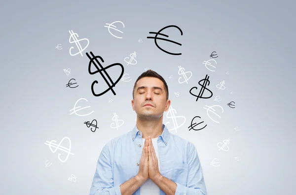 Happy man praying god for money — Φωτογραφία Αρχείου