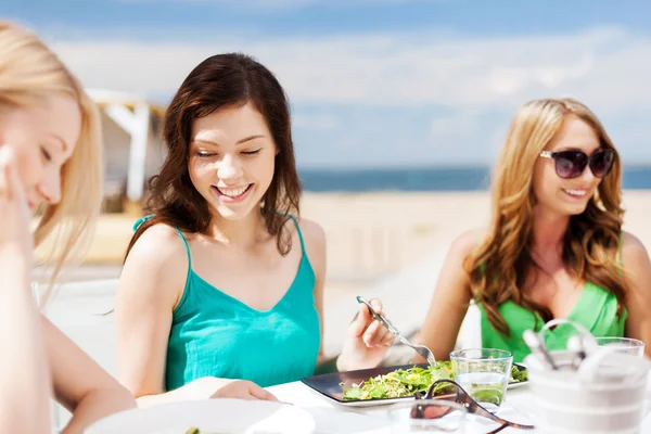 Girls in cafe on the beach — Stock Photo, Image