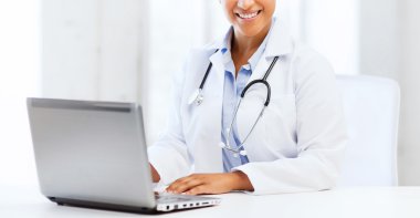 female doctor with laptop pc clipart