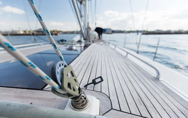 Close up of sailboat deck or yacht sailing on sea — Stok fotoğraf