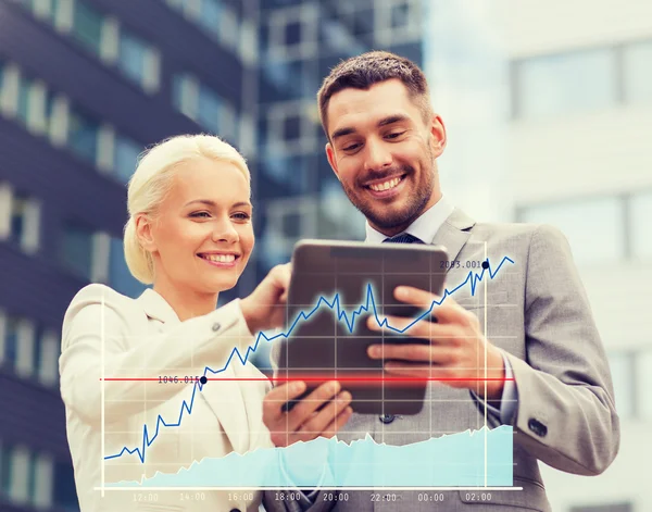 Smiling businessmen with tablet pc outdoors — Stock Photo, Image