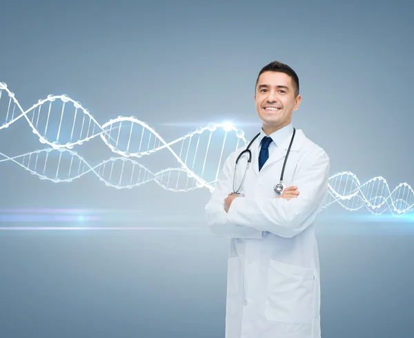 Smiling male doctor in white coat and dna molecule — ストック写真