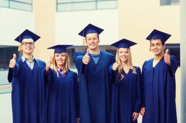 group of smiling students in mortarboards clipart