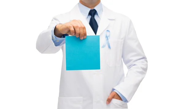 Doctor with prostate cancer awareness ribbon — Stock Photo, Image