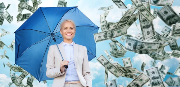 Happy young businesswoman with umbrella outdoors — Stock Photo, Image