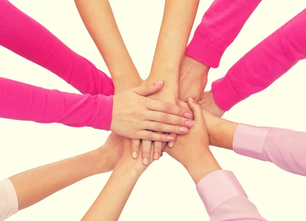 Close up of women with hands on top — Stock Photo, Image