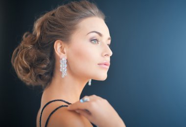 woman with diamond earrings clipart