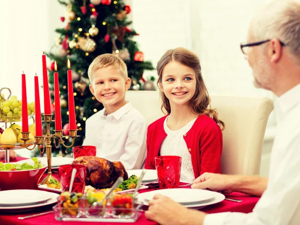 Smiling family having holiday dinner at home Stock Photo