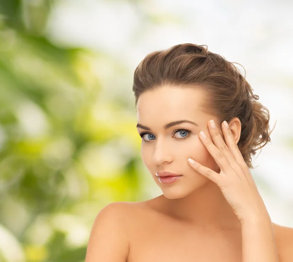 Beautiful woman with updo — Stock Photo, Image