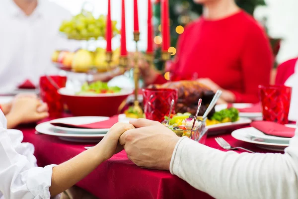 Close up of family having christmas dinner at home — Stock Photo, Image