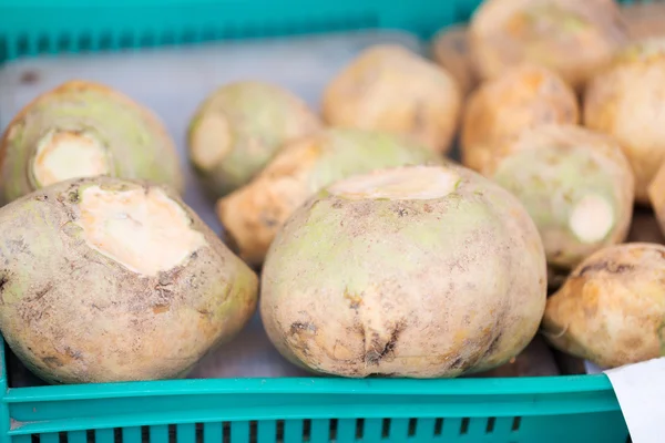 Close up of swede or turnip at street market — Stock Photo, Image