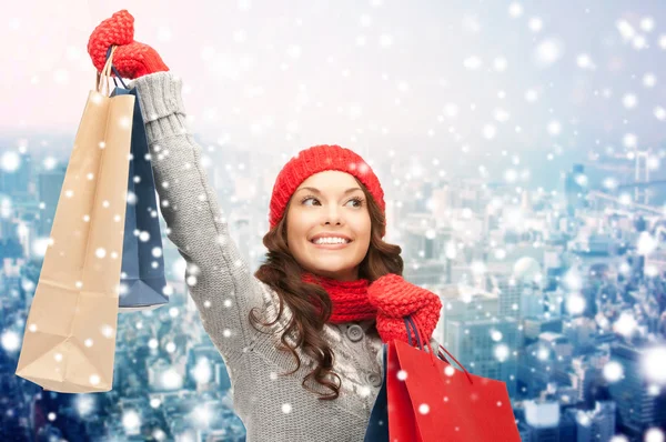 Happy woman with shopping bags — Stock Photo, Image