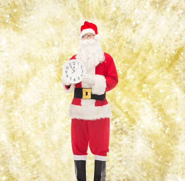 남자 시계와 산타 클로스의 의상 로열티 프리 스톡 사진