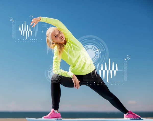 Woman doing sports outdoors — Stock Photo, Image