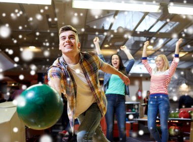 happy young man throwing ball in bowling club clipart