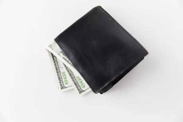 Close up of dollar money in black wallet on table — Stock Photo, Image