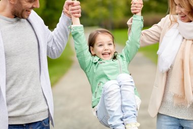 happy family walking in summer park and having fun clipart