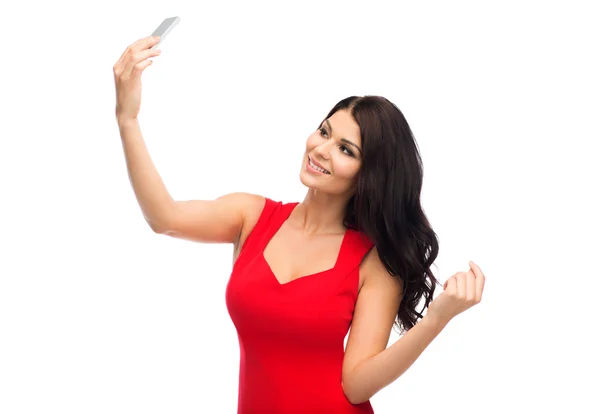 Σέξι γυναίκα λαμβάνοντας αυτοπορτρέτα εικόνα από το smartphone — Φωτογραφία Αρχείου