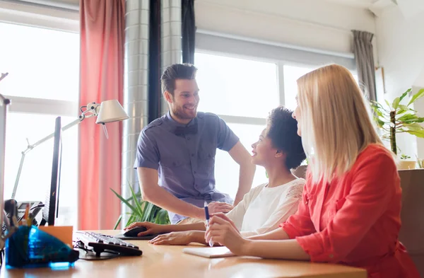 Happy creative team in office — Stock Photo, Image