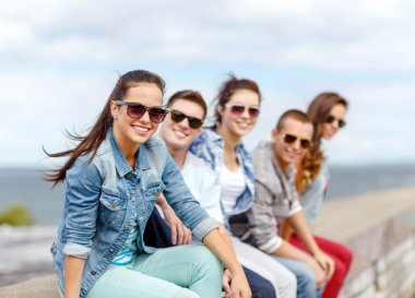 smiling teenage girl hanging out with friends clipart