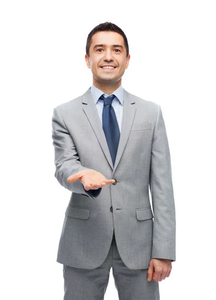 Happy usmívající se podnikatel v obleku — Stock fotografie