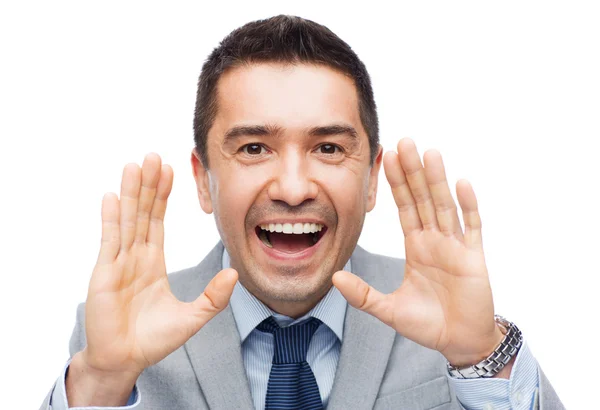 Homem de negócios feliz em terno gritando — Fotografia de Stock