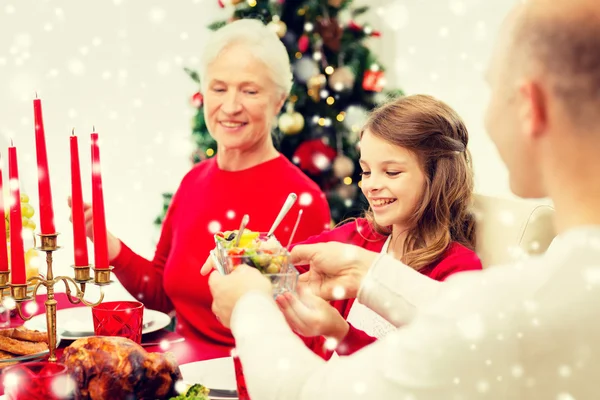 Smiling family having holiday dinner at home — Stock Photo, Image