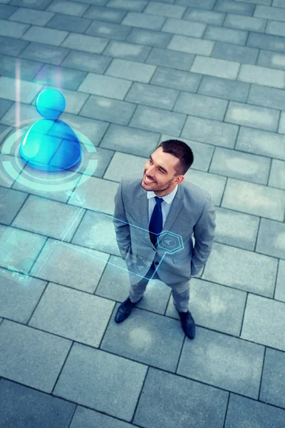 Young smiling businessman outdoors from top — Stock Photo, Image