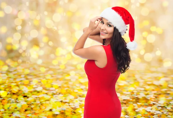 Noel Baba şapkası ve kırmızı elbise güzel seksi kadın — Stok fotoğraf