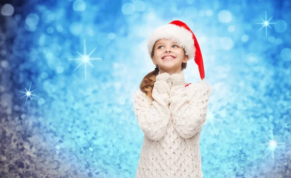 Dreaming girl in santa helper hat — Stock Photo, Image