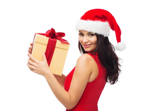 Beautiful sexy woman in santa hat with gift box — Stock Photo, Image