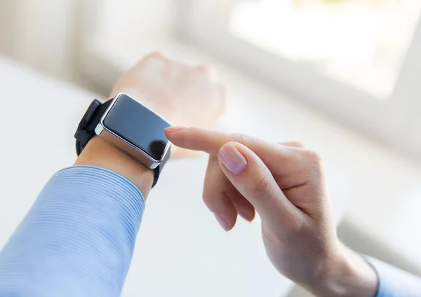 Close up of hands setting smart watch — Stock Photo, Image