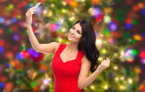 Sexy woman taking selfie picture by smartphone — Stock Photo, Image