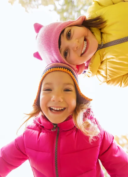 Happy girls faces outdoors — Stock Photo, Image