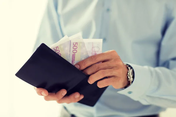 Close up of businessman hands holding money — Stock Photo, Image