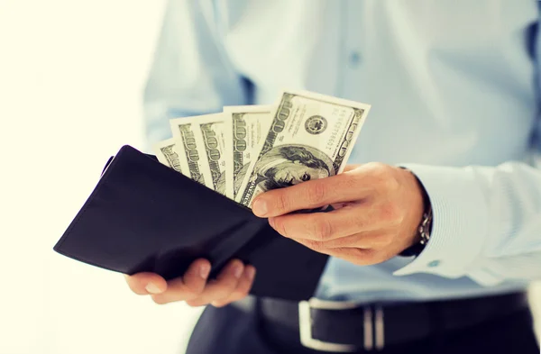 Close up of businessman hands holding money — Stock Photo, Image