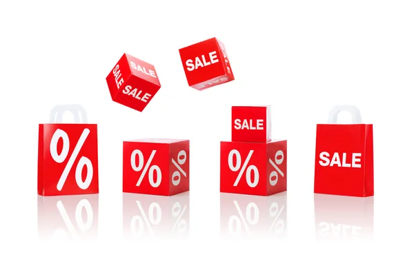 Boxes and shopping bags with sale and percent sign — 图库照片