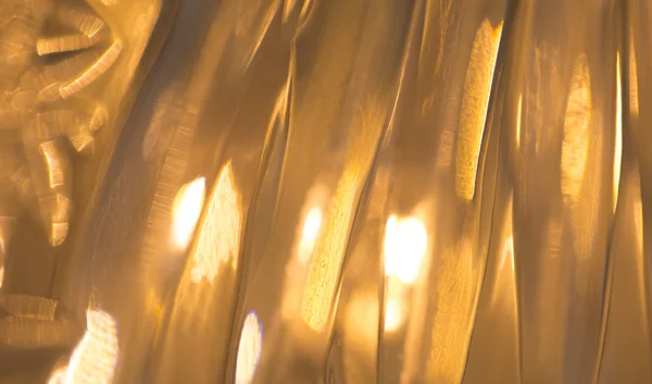 Lights reflection on golden metallic background — Stock Photo, Image