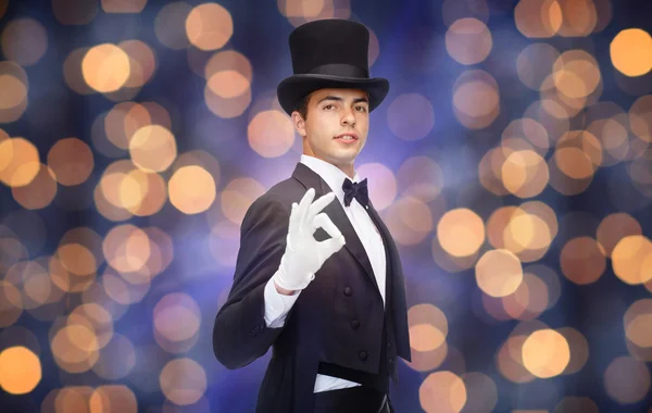 Magician in top hat showing ok hand sign — Stock Photo, Image