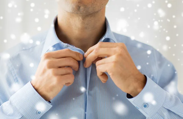 Close up of man in shirt dressing — Stock Photo, Image